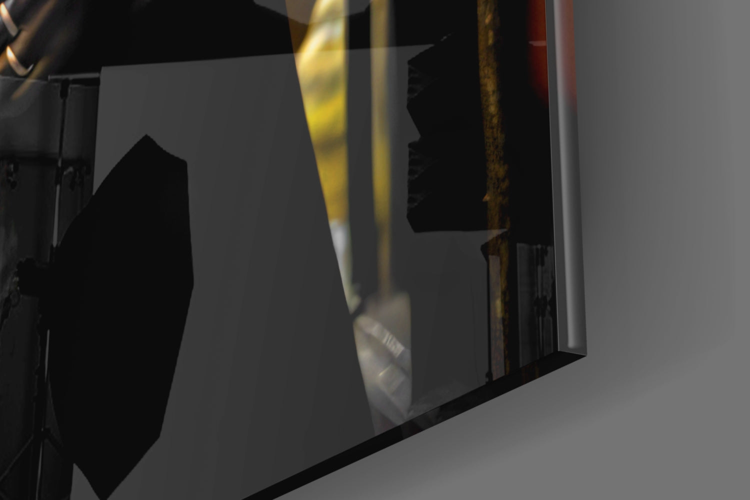 Close-up angled view of glass wall art showing leopard silhouette profile with golden and black tones against white background.