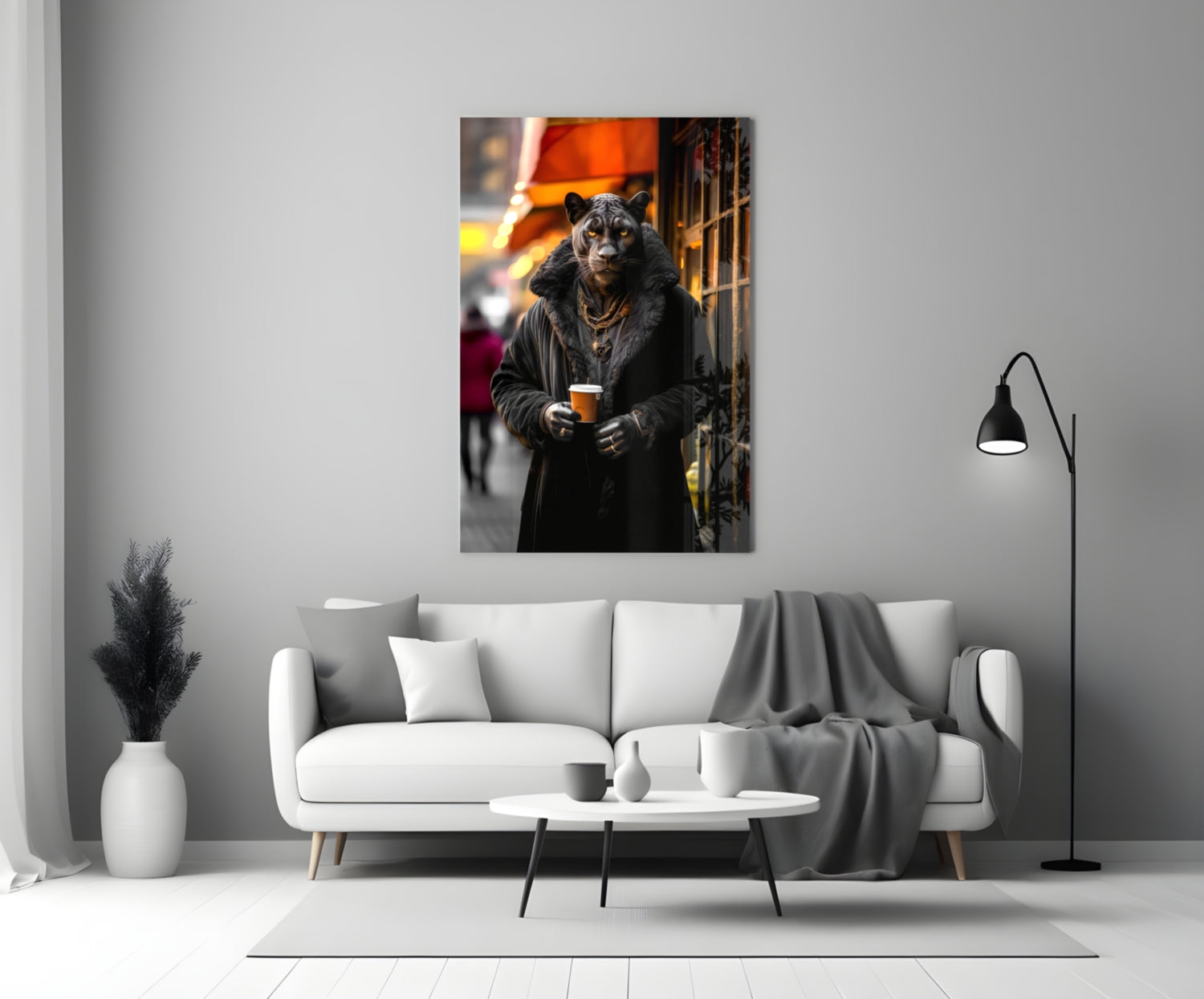 Glass wall art print displayed above a white sofa showing a leopard wearing a black coat and gold chain holding a coffee cup in an urban street setting.