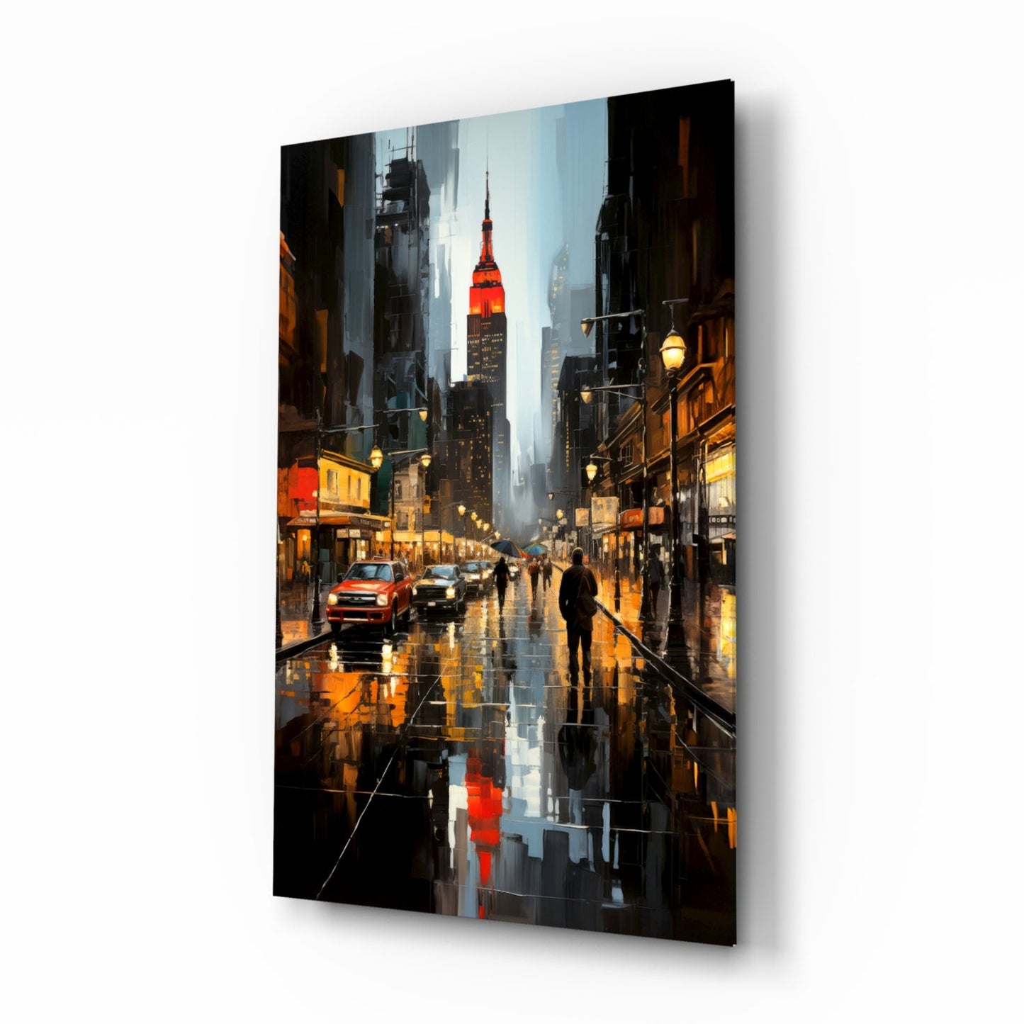 Angled perspective view of a glass wall art panel depicting a rainy New York City street with illuminated storefronts, the red-topped Chrysler Building, and yellow street lamps reflecting on wet pavement.