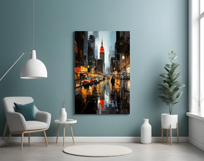 City street scene with illuminated Empire State Building at dusk, displayed as glass wall art above a white armchair in a teal-walled interior.