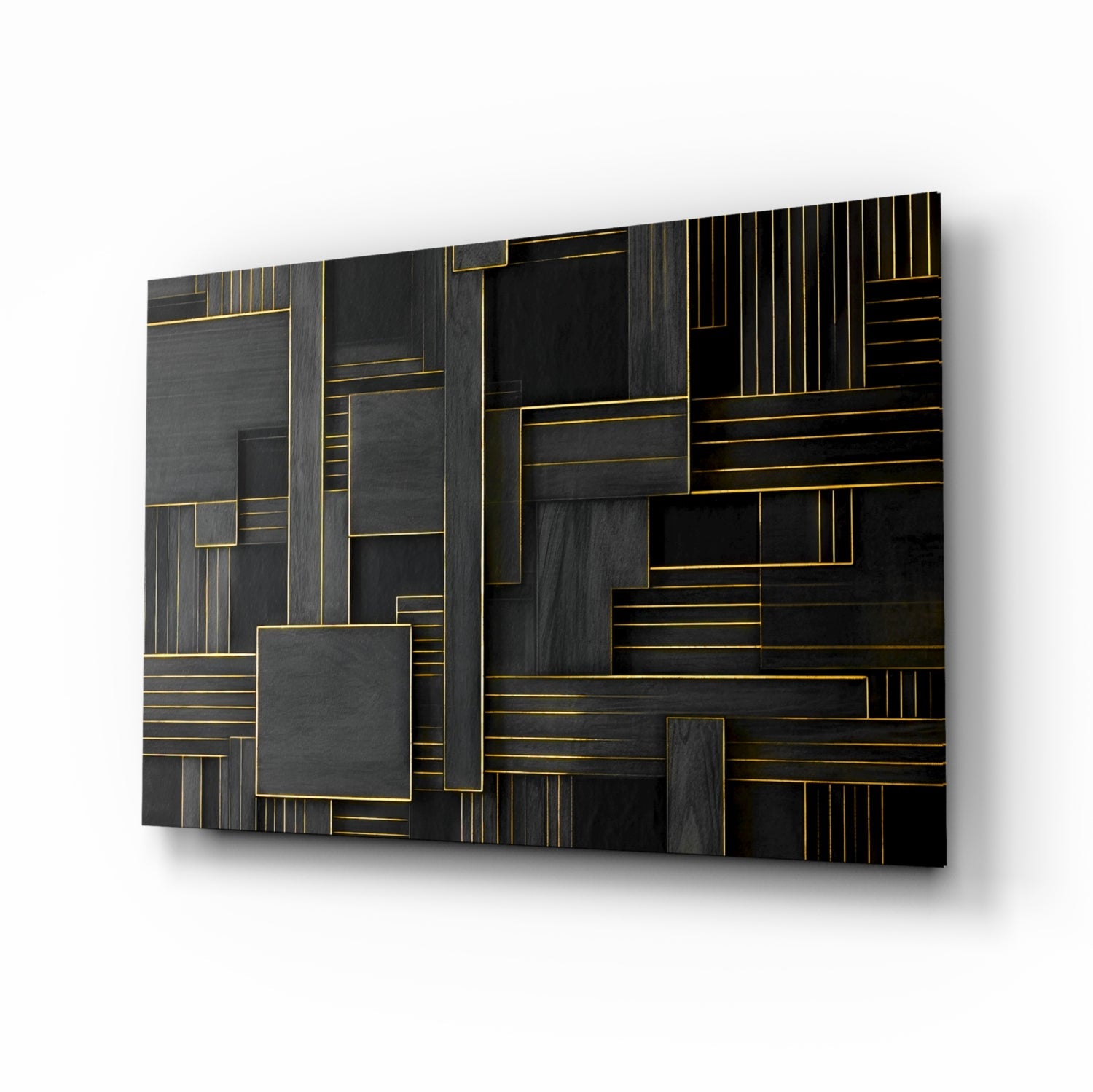 Modern glass wall art panel with geometric black and gold rectangles in layered, abstract pattern, angled perspective view.