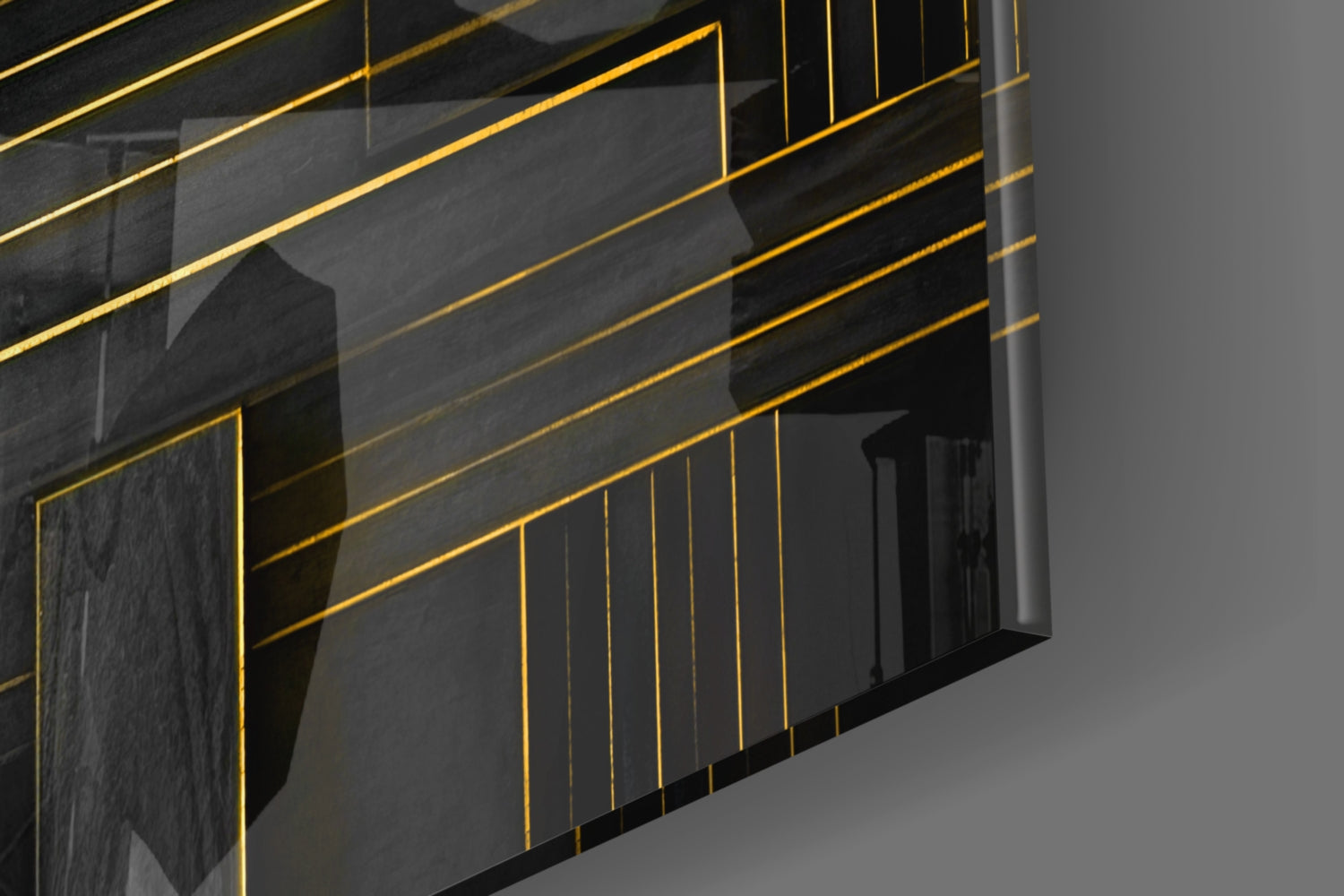 3D architectural rendering of modern building facade with dark glass panels outlined in gold geometric lines against gray background.