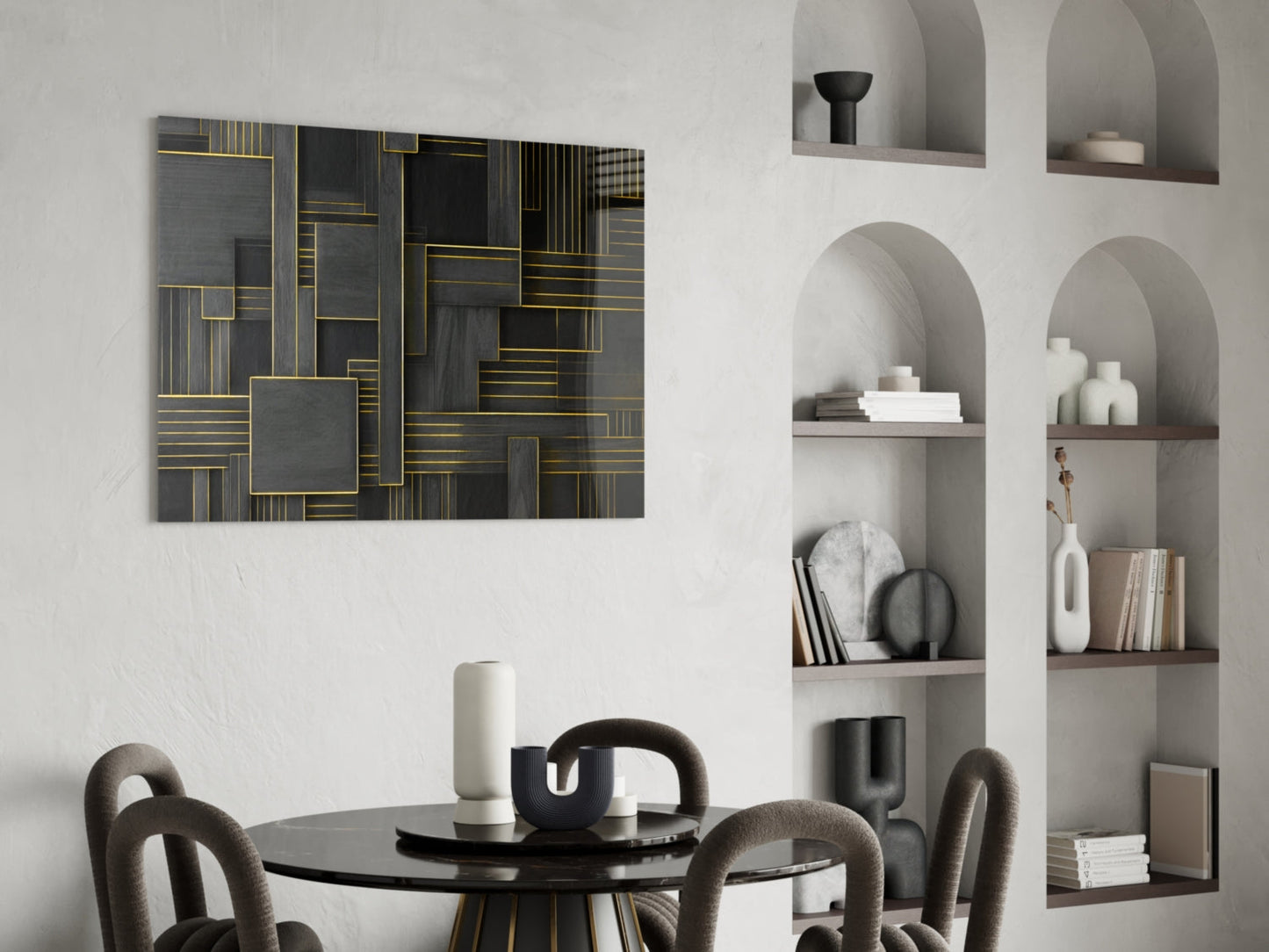 Dark geometric wall art with gold-outlined rectangles displayed above round dining table in modern interior setting.