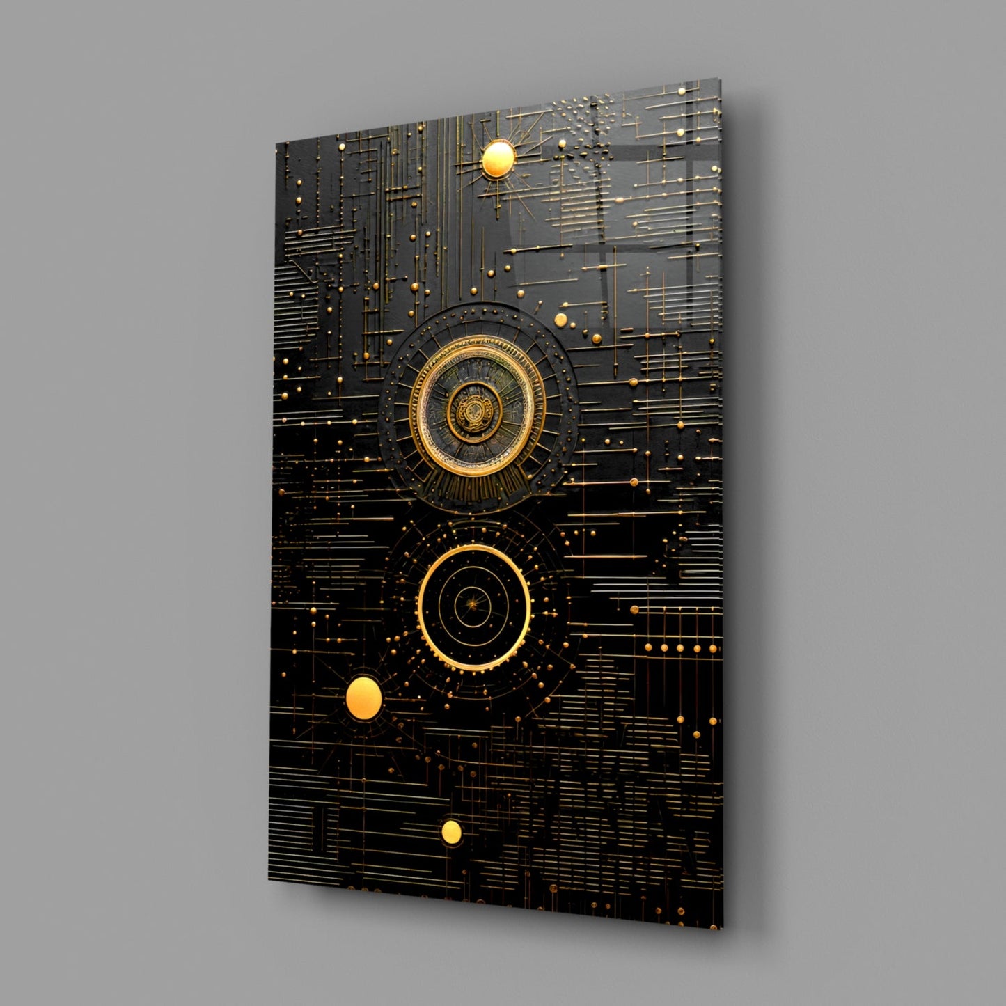 Angled view of black glass wall art with gold concentric circles, circuit-line patterns, and illuminated golden spheres against gray background.