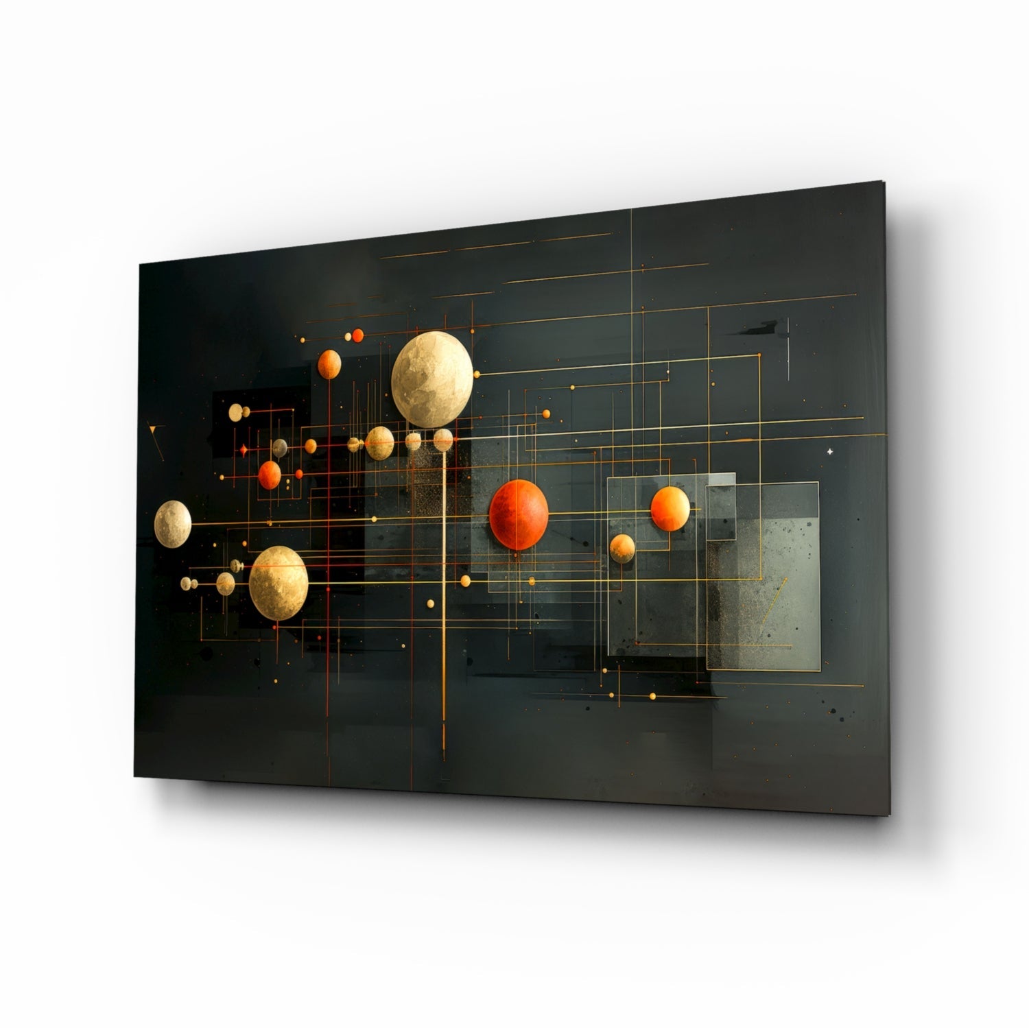 Modern glass wall art panel featuring golden and orange spheres with geometric gold line patterns on dark background, angled perspective view.