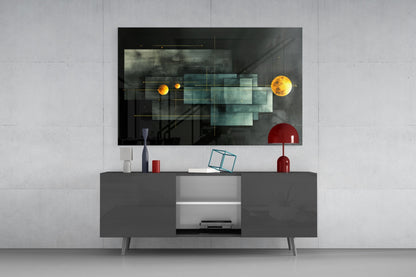 Modern living room display featuring Planet Race glass wall art mounted above gray media console, showing yellow and red celestial spheres connected by gold lines on dark background.