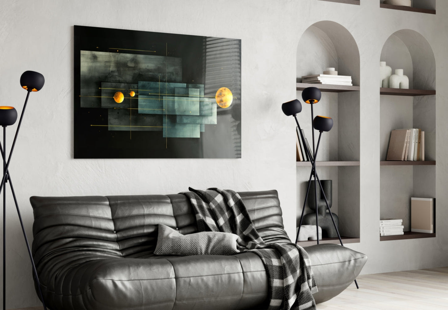 Modern living room featuring Planet Race glass wall art above black leather sofa with glowing yellow planets on dark background.