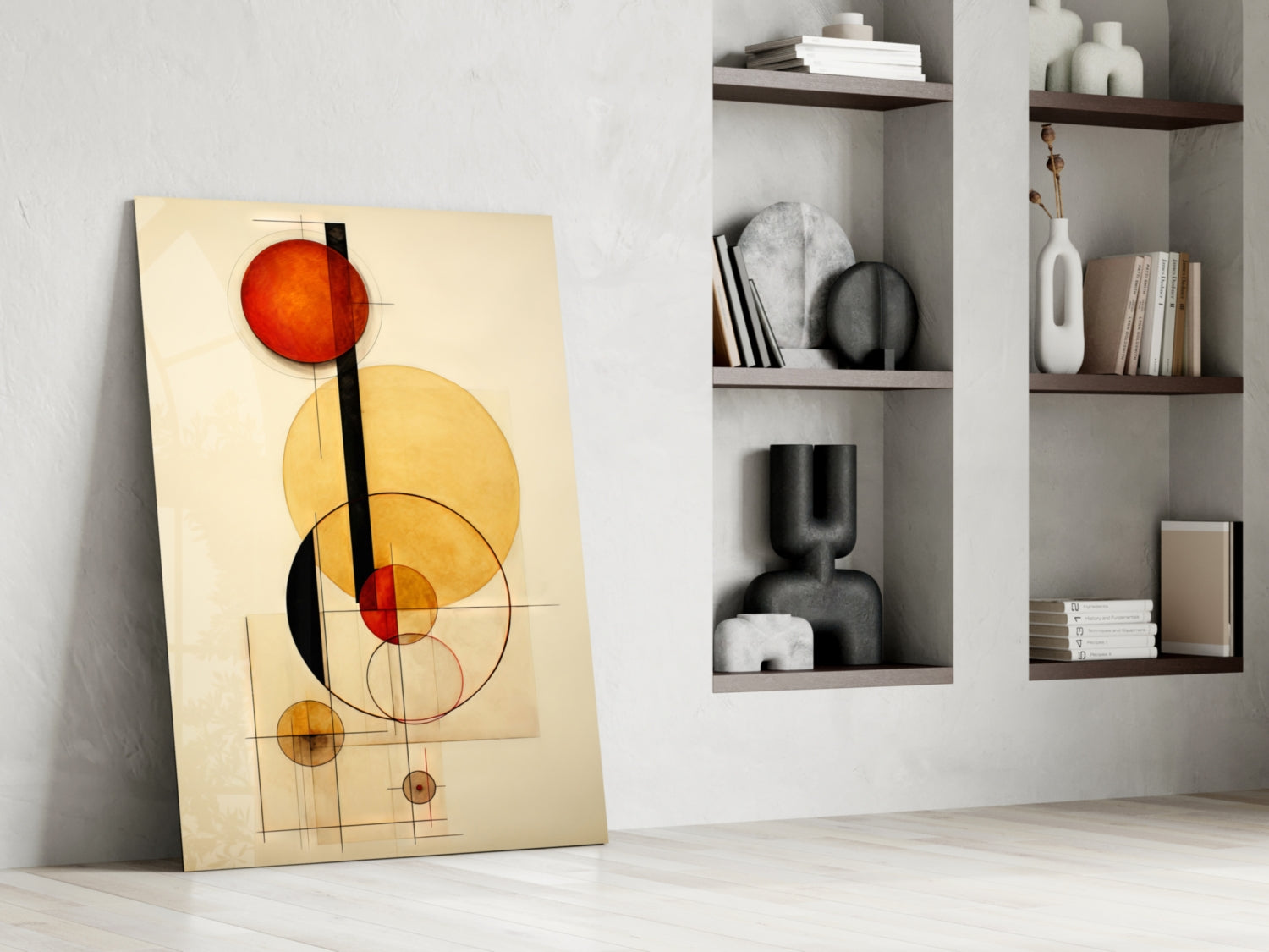 Abstract geometric glass wall art leaning against white wall beside built-in shelving, featuring red, yellow, and black circles on cream background.