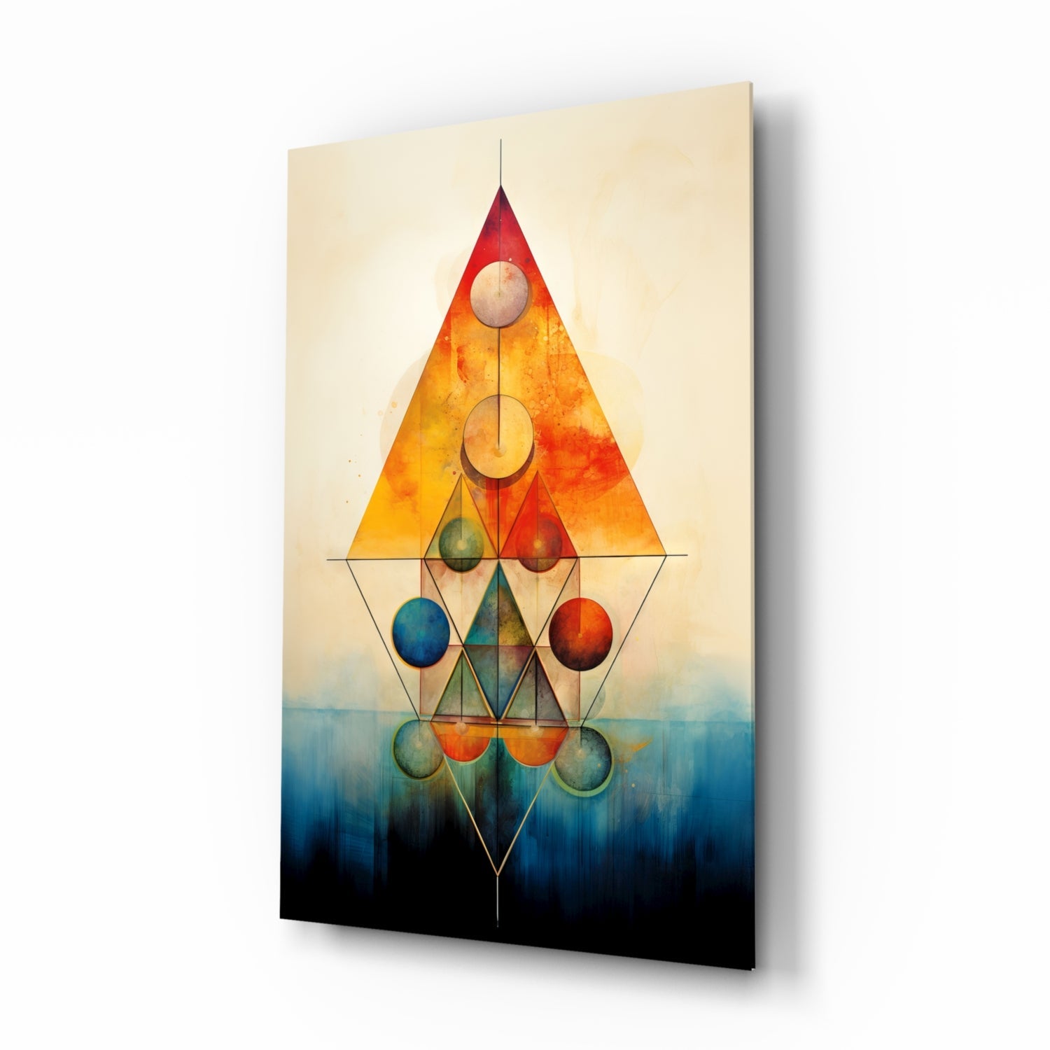 Glass wall art panel featuring geometric triangles and spheres in warm and cool gradients, displayed at an angle against white background.