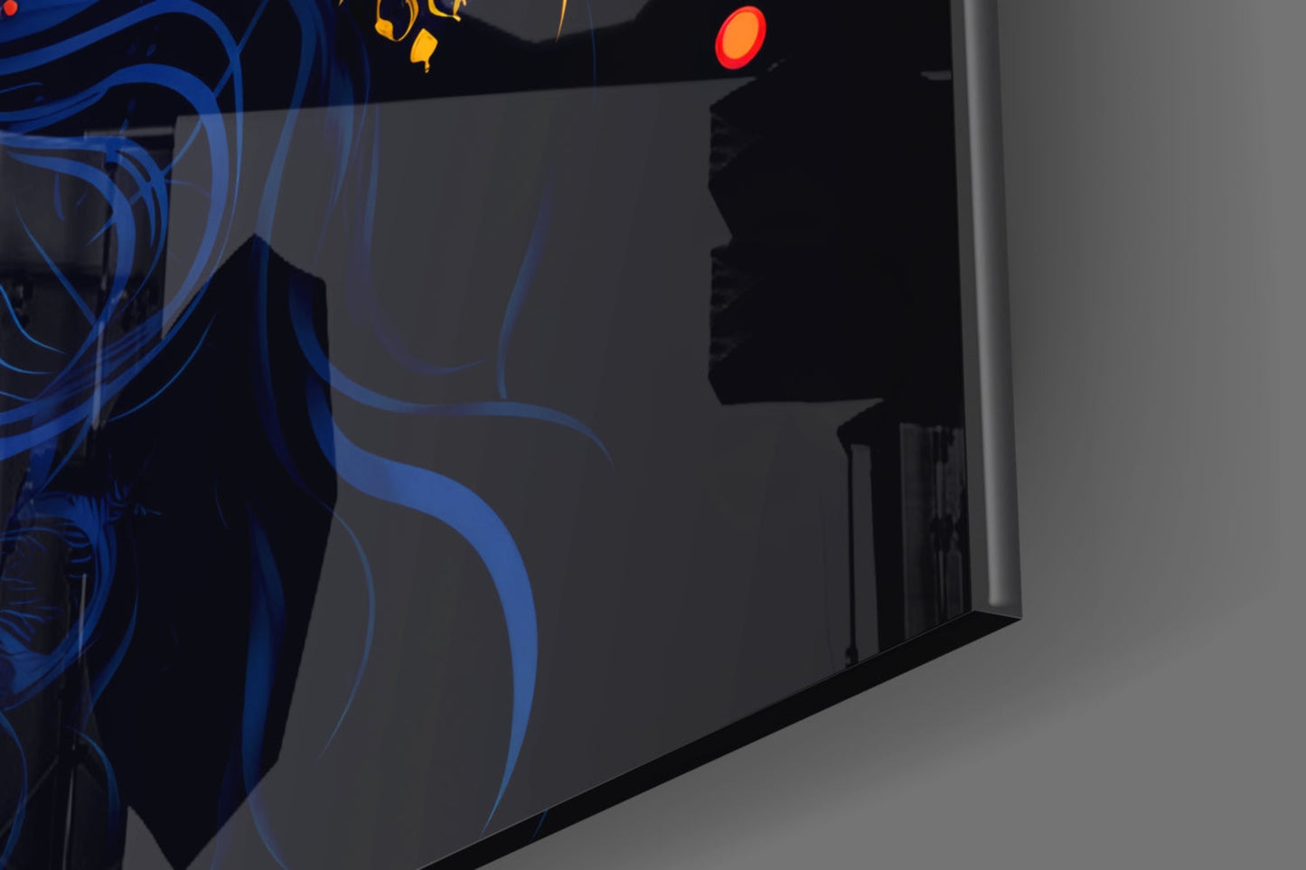 Close-up angled view of glass wall art featuring blue flowing lines and red circular elements against dark background with illuminated details.