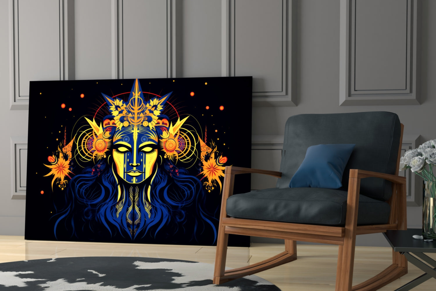 Black glass wall art featuring a mystical blue and gold face with yellow eyes, ornate headdress, and orange celestial elements, displayed in a modern living room beside a wooden chair.