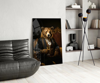 Glass wall art depicting an anthropomorphic bear in formal black jacket holding a wine glass, displayed in a modern living room setting.