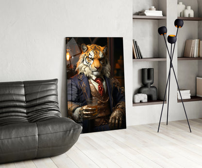 Styled interior scene featuring Duke Lion glass wall art leaning against white wall beside gray leather chair and black floor lamp with shelving.