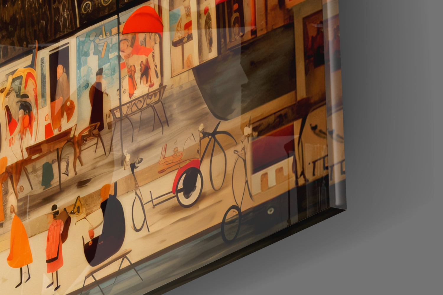 Angled view of glass wall art depicting stylized Parisian street scenes in red, orange, and black with bicycles and figures in period clothing.