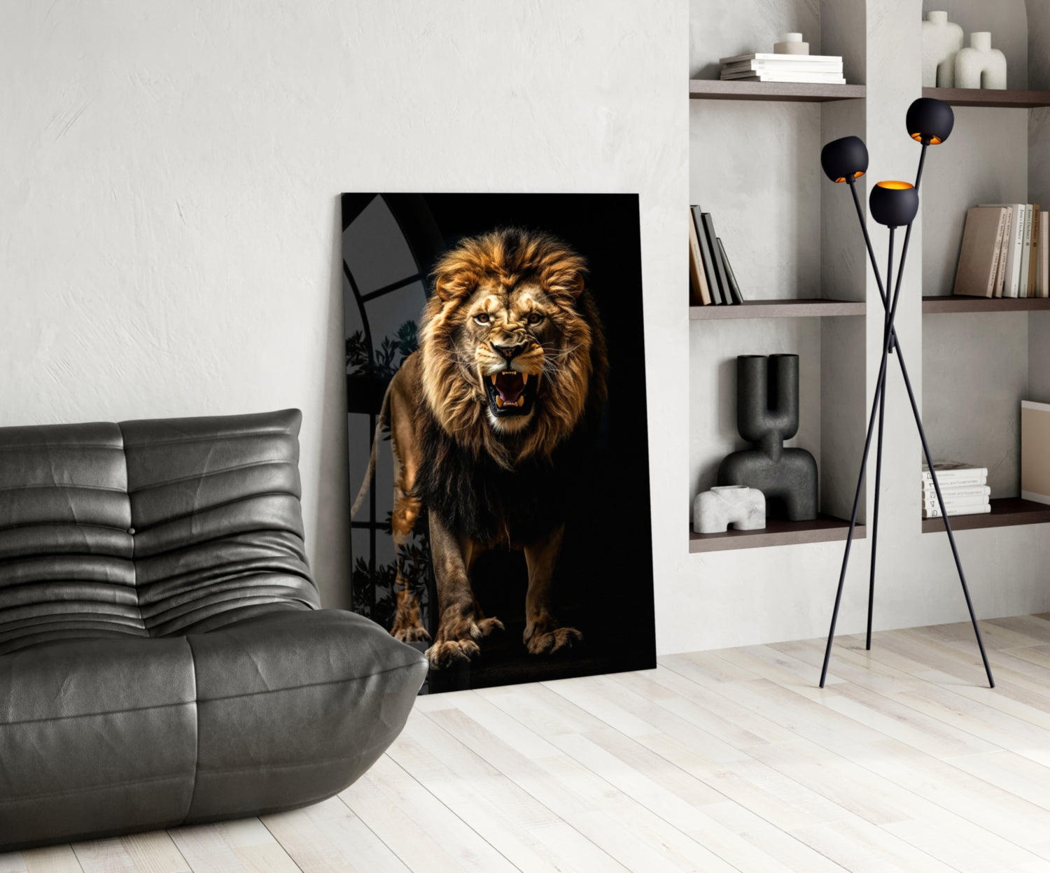 Black glass wall art featuring a roaring lion with golden mane against dark background, displayed in modern living room setting.