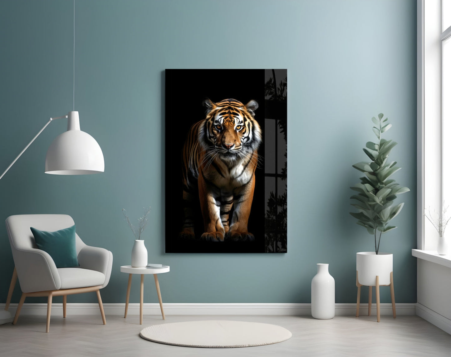 Tiger glass wall art mounted on teal wall above white chair in minimalist interior setting.