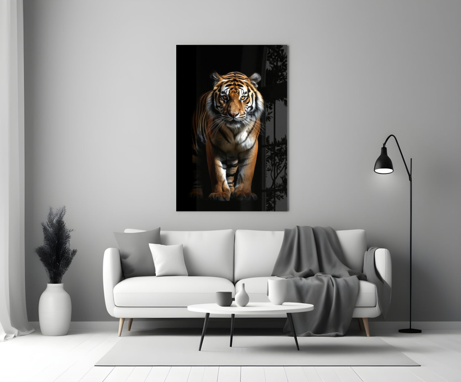 Tiger glass wall art hanging above a white sofa in a minimalist living room setting.