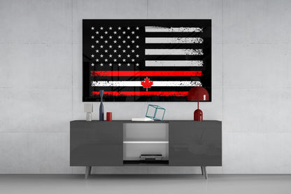 Distressed USA-Canada flag glass wall art displayed above gray media console, featuring stars, red maple leaf, and weathered stripes in black, white, and red.