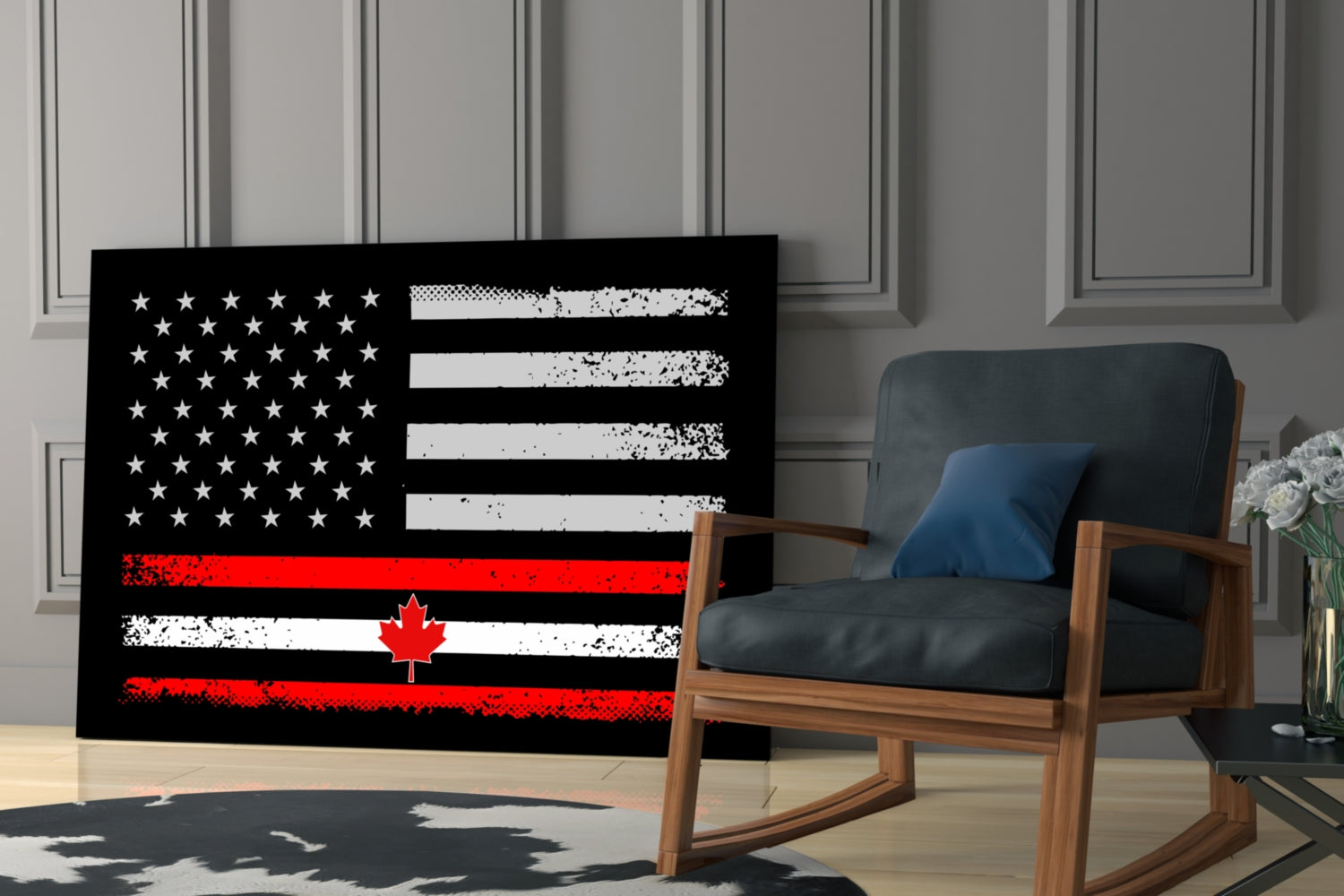 Black glass wall art displaying distressed USA and Canada flags with white stars, gray and white stripes, red maple leaf, and red stripes, positioned in modern living room with wooden chair.