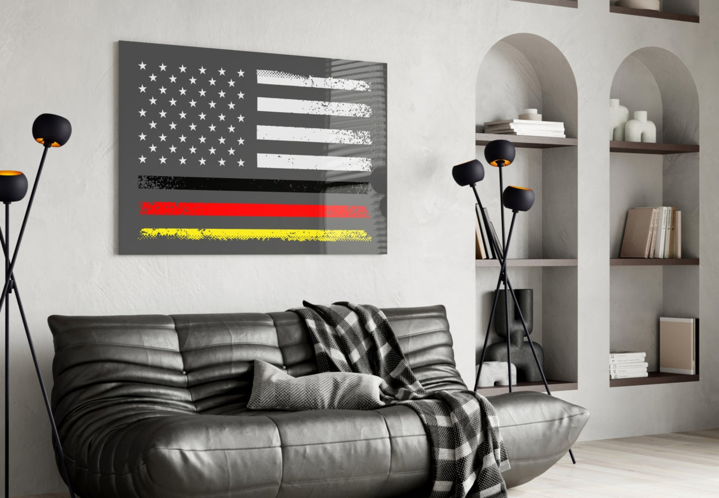 Modern living room with USA-Germany flag glass wall art above black leather sofa, featuring white stars, red and yellow horizontal stripes.
