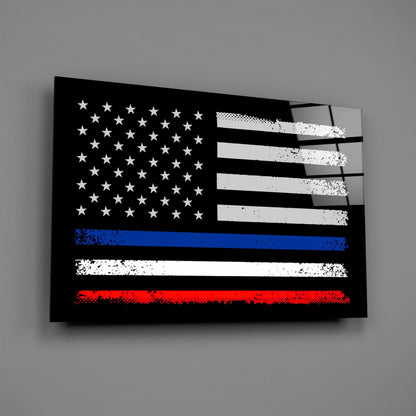 Black glass wall art featuring distressed American flag with white stars and stripes, blue line, and red stripe, mounted at angle on gray wall.