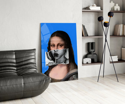 Contemporary Mona Lisa glass wall art displayed in modern living room with gray sofa, featuring blue background and classical portrait with surreal overlay elements.
