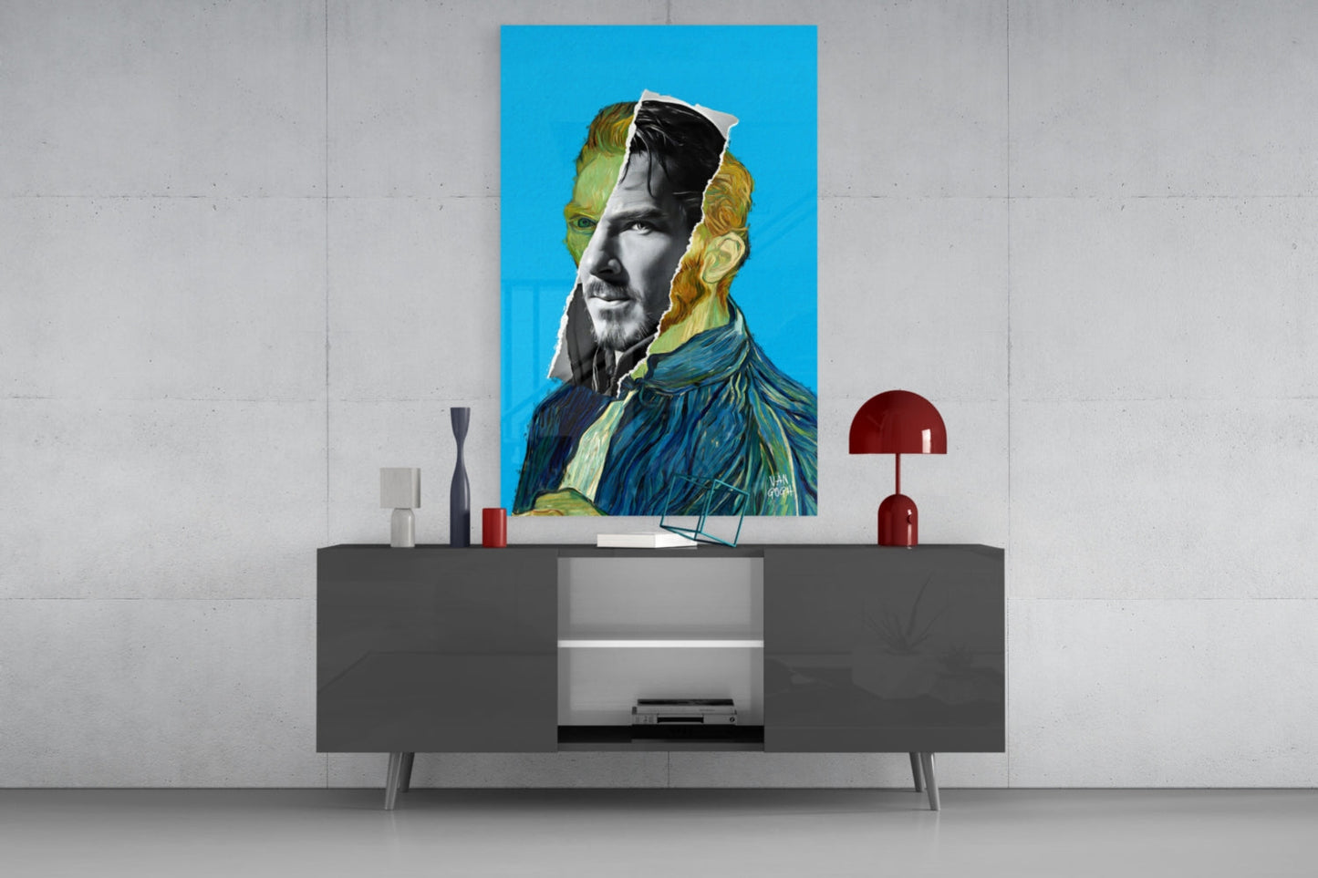 Contemporary portrait glass wall art featuring Van Gogh-inspired imagery with blue background displayed above gray media console.