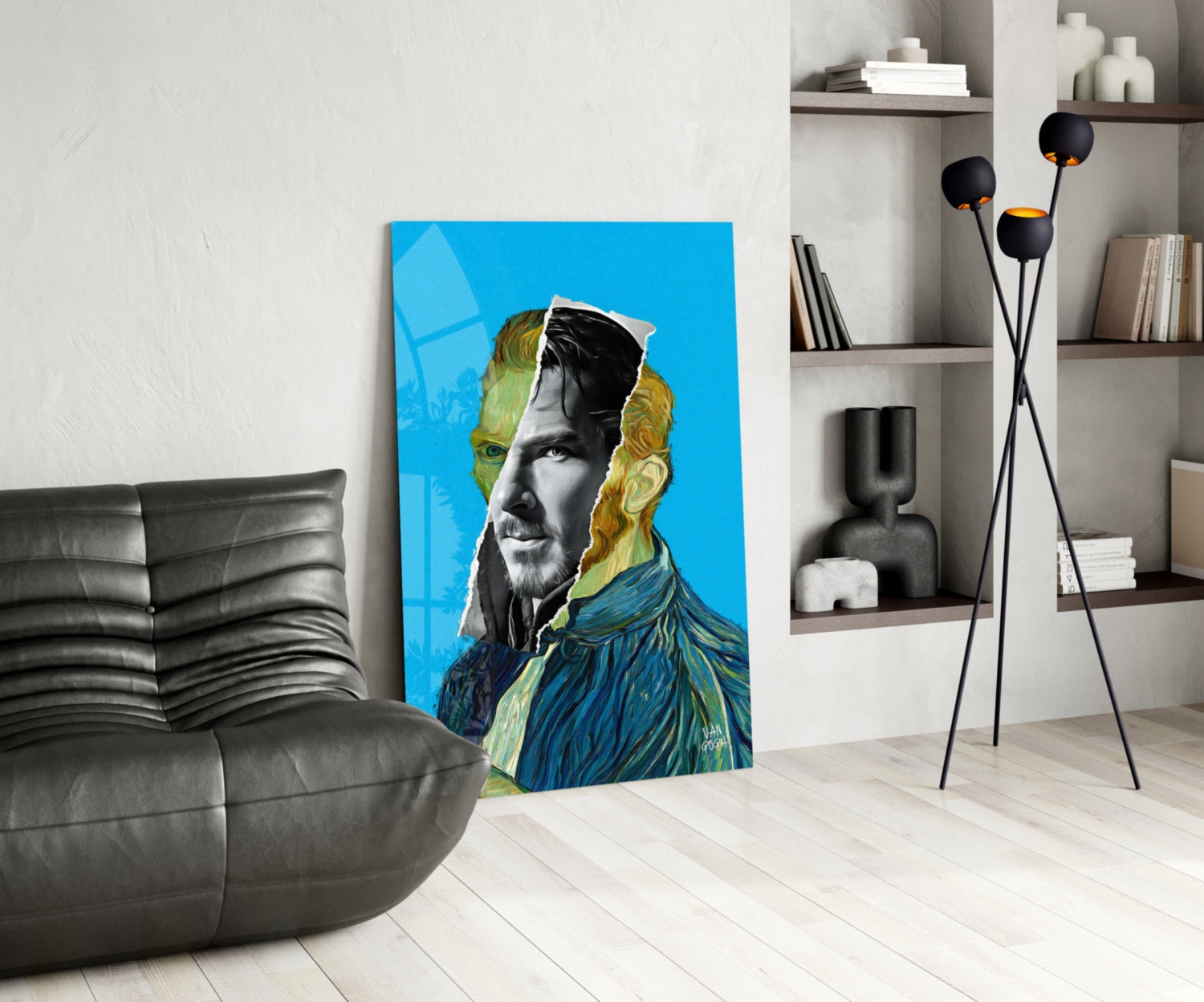Modern living room interior with contemporary glass wall art featuring a portrait with blue and golden yellow tones leaning against white wall.