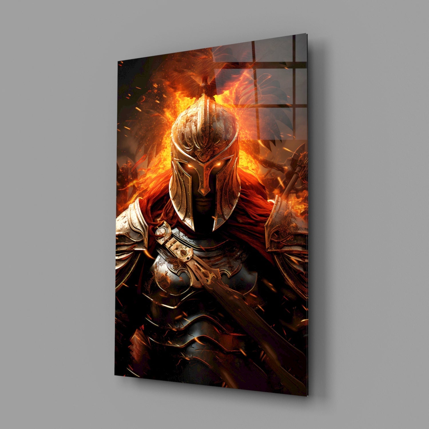 Angled view of glass wall art depicting a fiery armored warrior with glowing orange flames and ornate gold armor against dark background.
