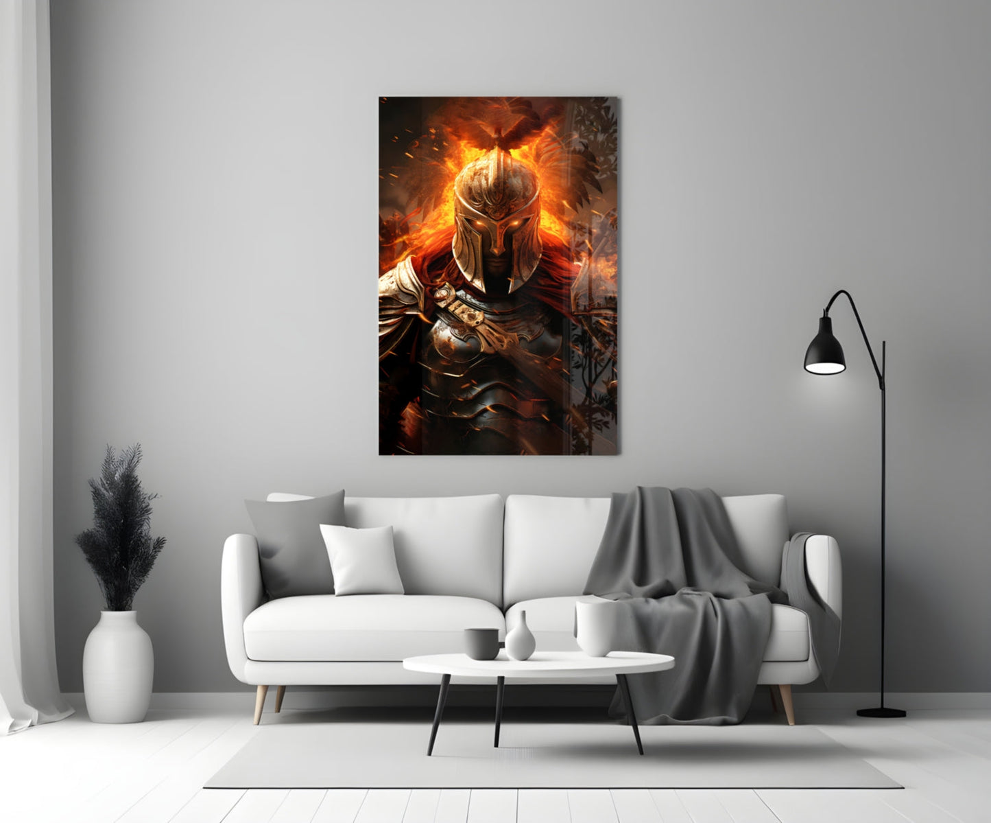 Warrior Glass Wall Art mounted above a white sofa in a modern living room, displaying a golden-armored warrior surrounded by orange flames.