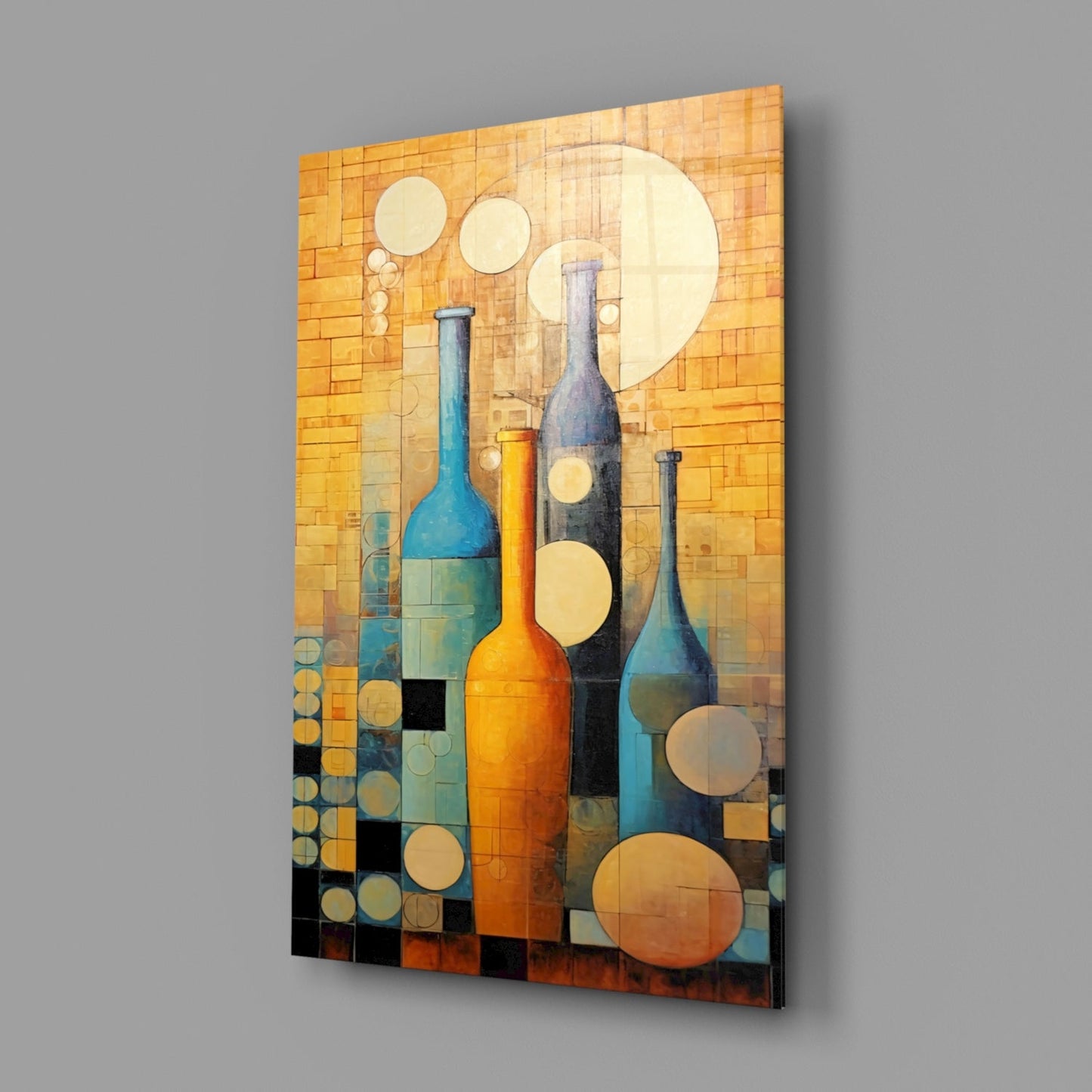 Abstract geometric glass wall art depicting three wine bottles in blue, orange, and dark tones with circular elements on warm golden-tiled background.