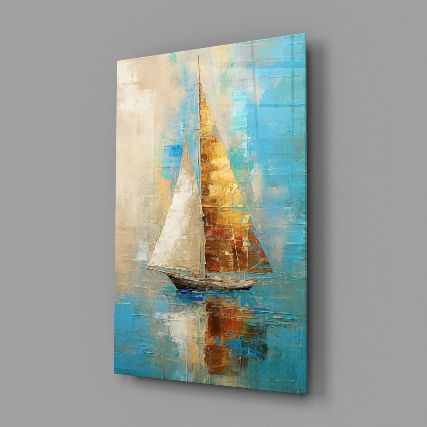 Angled view of a glass wall art panel featuring a sailboat with white and golden sails against turquoise and cream layered background.