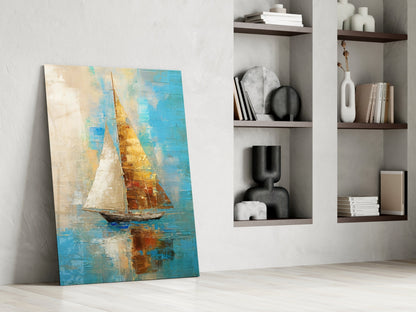 Abstract sailboat glass wall art leaning against white wall beside built-in shelving with decorative objects.