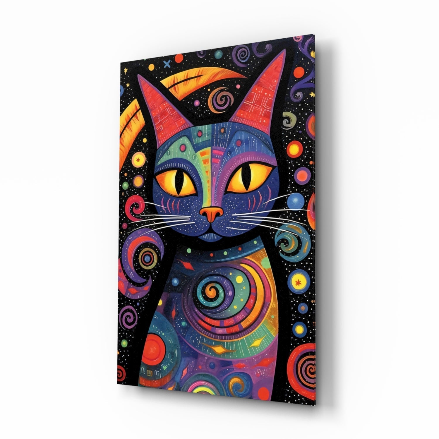 Angled three-quarter view of a colorful glass wall art panel featuring a stylized cat with pointed ears, golden eyes, and intricate geometric patterns in blue, red, orange, and purple against a black starry background.