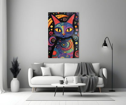 Colorful Night Cat glass wall art displaying a blue and red cat with yellow eyes and spiral patterns hung above a white sofa in a minimalist living room.