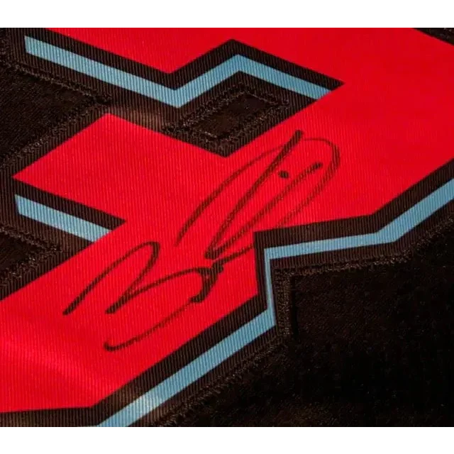 Red and black Dwayne Wade autographed jersey with signature and light blue outline