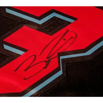Red and black Dwayne Wade autographed jersey with signature and light blue outline