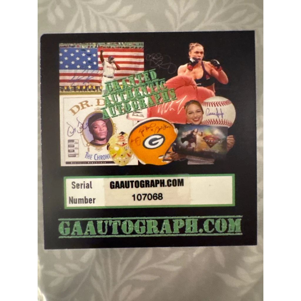 Black card with celebrity autographs and serial number from Dwayne Wade autographed jersey