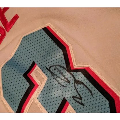 Dwyane Wade autographed Miami Heat jersey with blue, white, red, and black trim