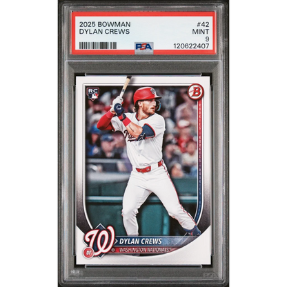 Dylan Crews 2025 Bowman PSA graded Nationals rookie card in white red uniform holding bat