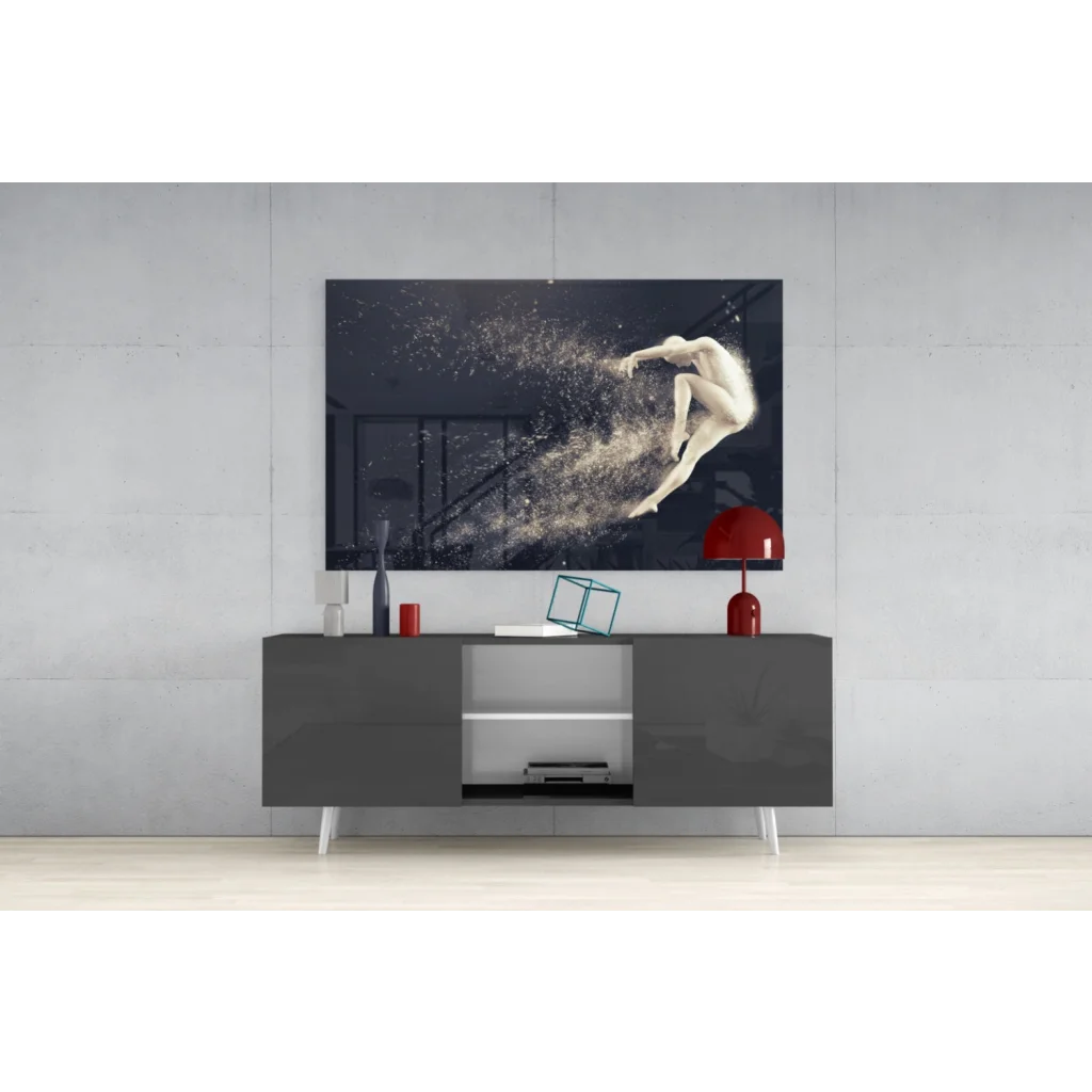 Sleek gray console table with white legs under dynamic leap glass wall art