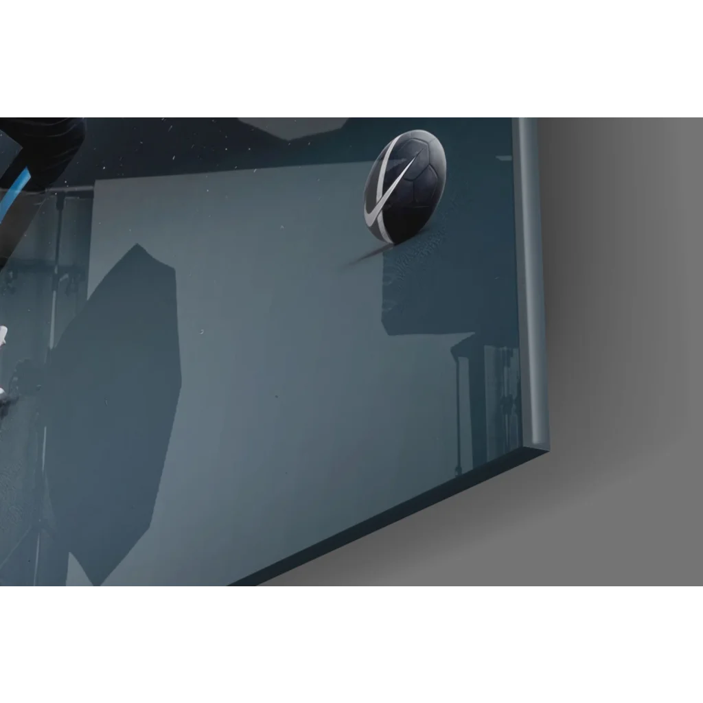 Sleek black silver circular wall clock on dynamic sports splash glass wall art