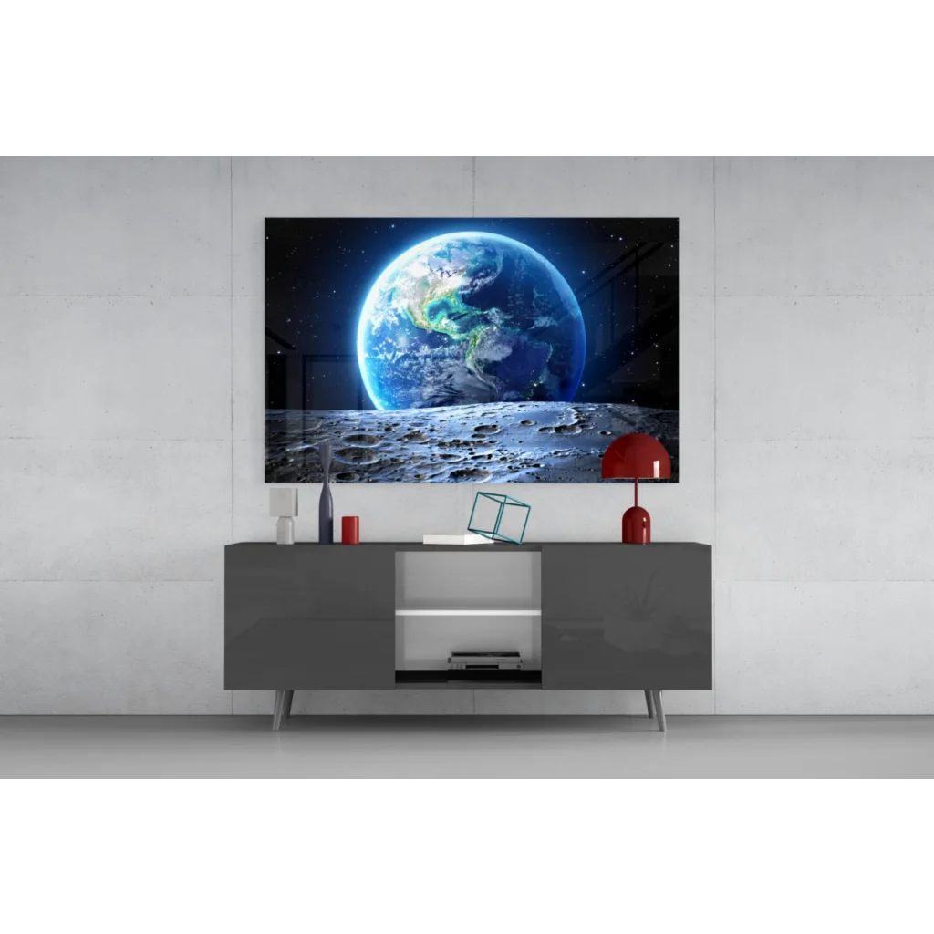 Sleek gray media console with minimalist legs below glass wall art print