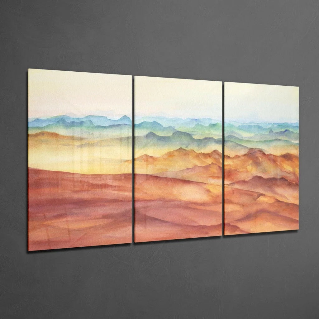 Layered mountain sunset watercolor triptych wall art in orange, red, blue-green