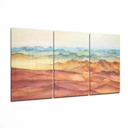 Layered mountain sunset watercolor triptych wall art in warm hues