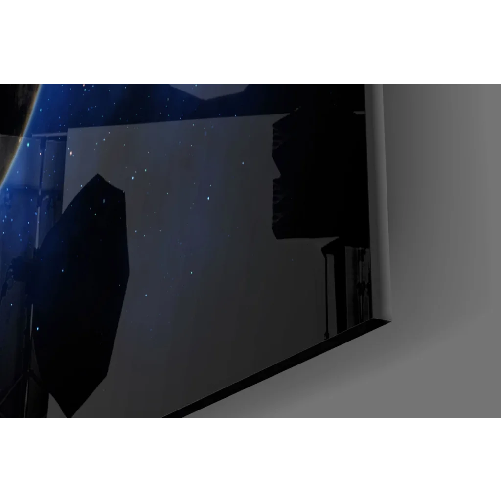 Sleek black-framed glass wall art of Earth from space on starry night sky
