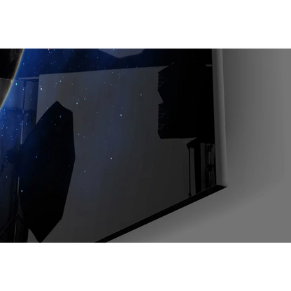 Sleek black-framed glass wall art of Earth from space on starry night sky