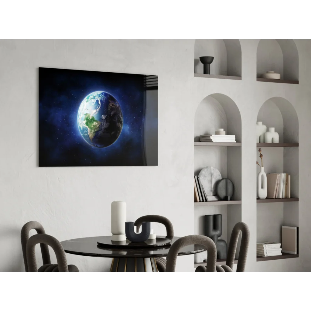 Sleek black-framed canvas wall art of glowing blue green Earth in starry space