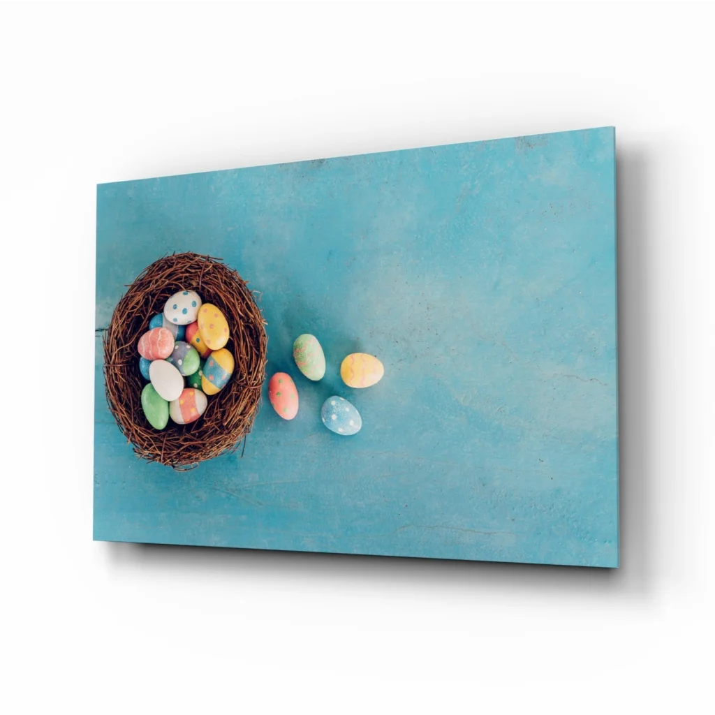 Rustic bird nest with speckled Easter eggs in glass wall art