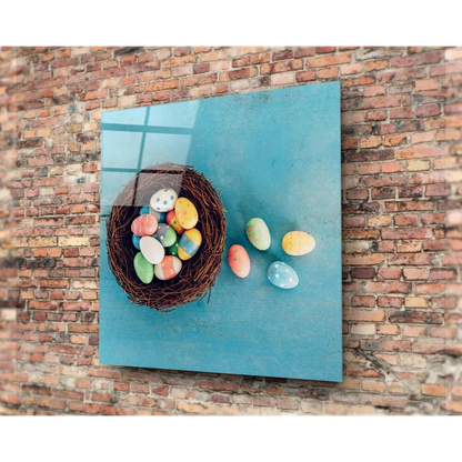 Vibrant blue glass wall art of Easter egg nest with colorful speckled eggs